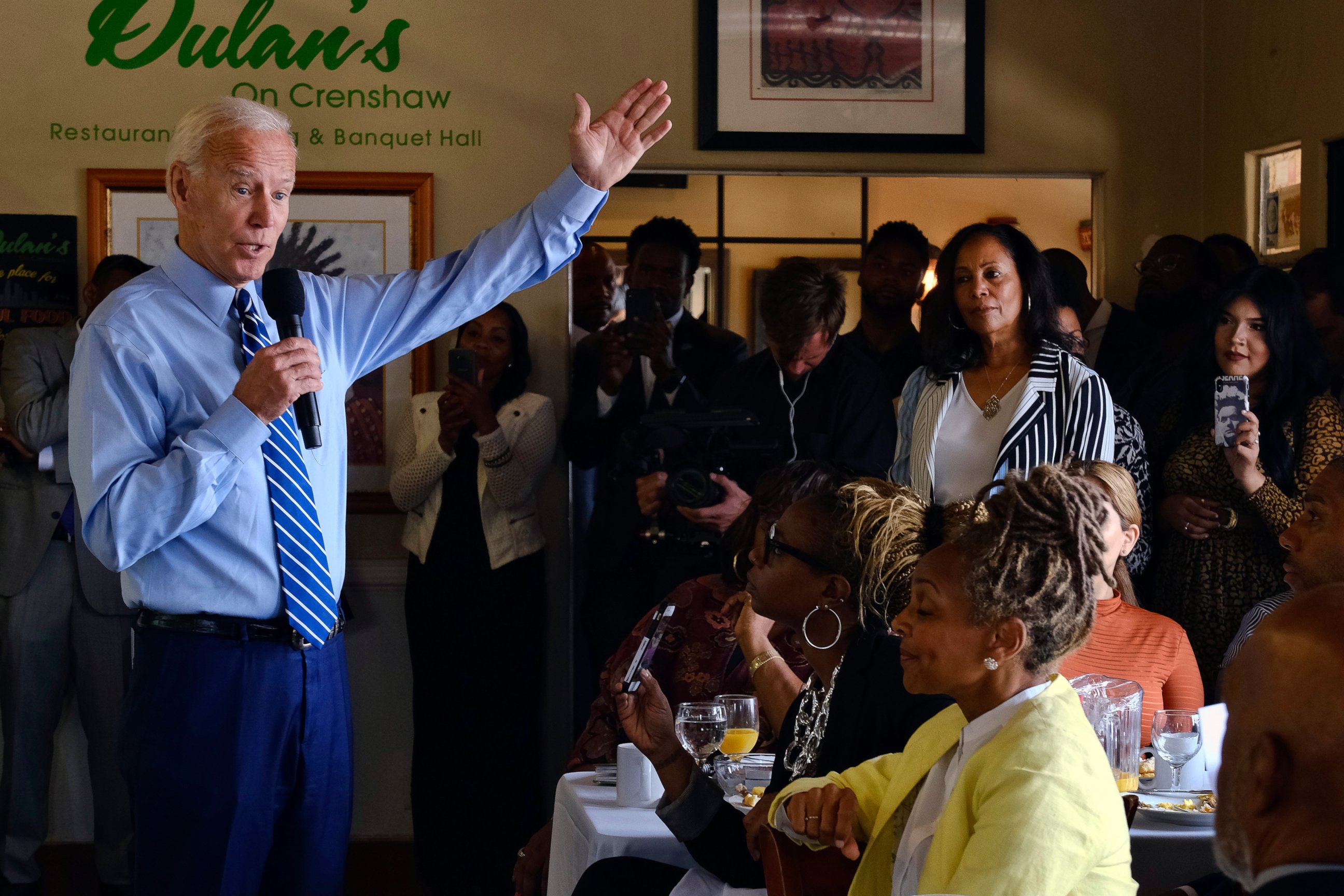 Democratic presidential candidate former Vice President Joe Biden speaks to community faith leaders after serving breakfast during a visit to Dulan's Soul Food on Crenshaw, Thursday, July 18, 2019, in Los Angeles.