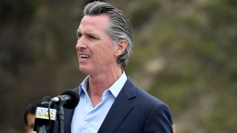FILE - In this April 23, 2021, file photo, California Gov. Gavin Newsom speaks during a press conference in Big Sur, Calif. California on Saturday is increasing early release credits for tens of thousands of inmates including violent and repeat felon