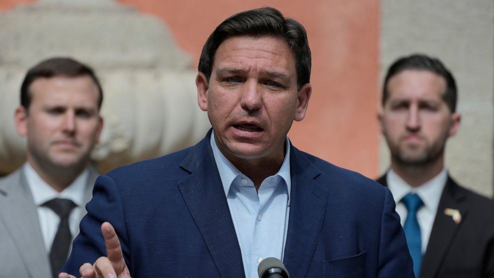 Florida Gov. Ron DeSantis speaks during a news conference, Feb. 1, 2022, in Miami. Gov. DeSantis has signed a bill that forbids instruction on sexual orientation and gender identity in kindergarten through third grade. The Republican governor signed 
