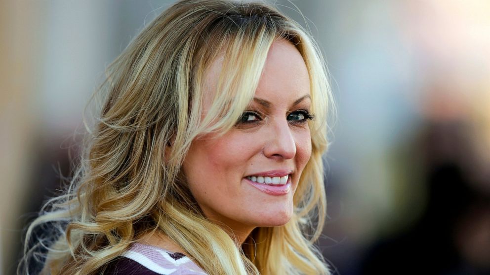 FILE - In this Oct. 11, 2018, file photo, adult film actress Stormy Daniels attends the opening of the adult entertainment fair "Venus," in Berlin. When Donald Trump left the White House in January 2021, he remained "Individual-1" in the federal camp