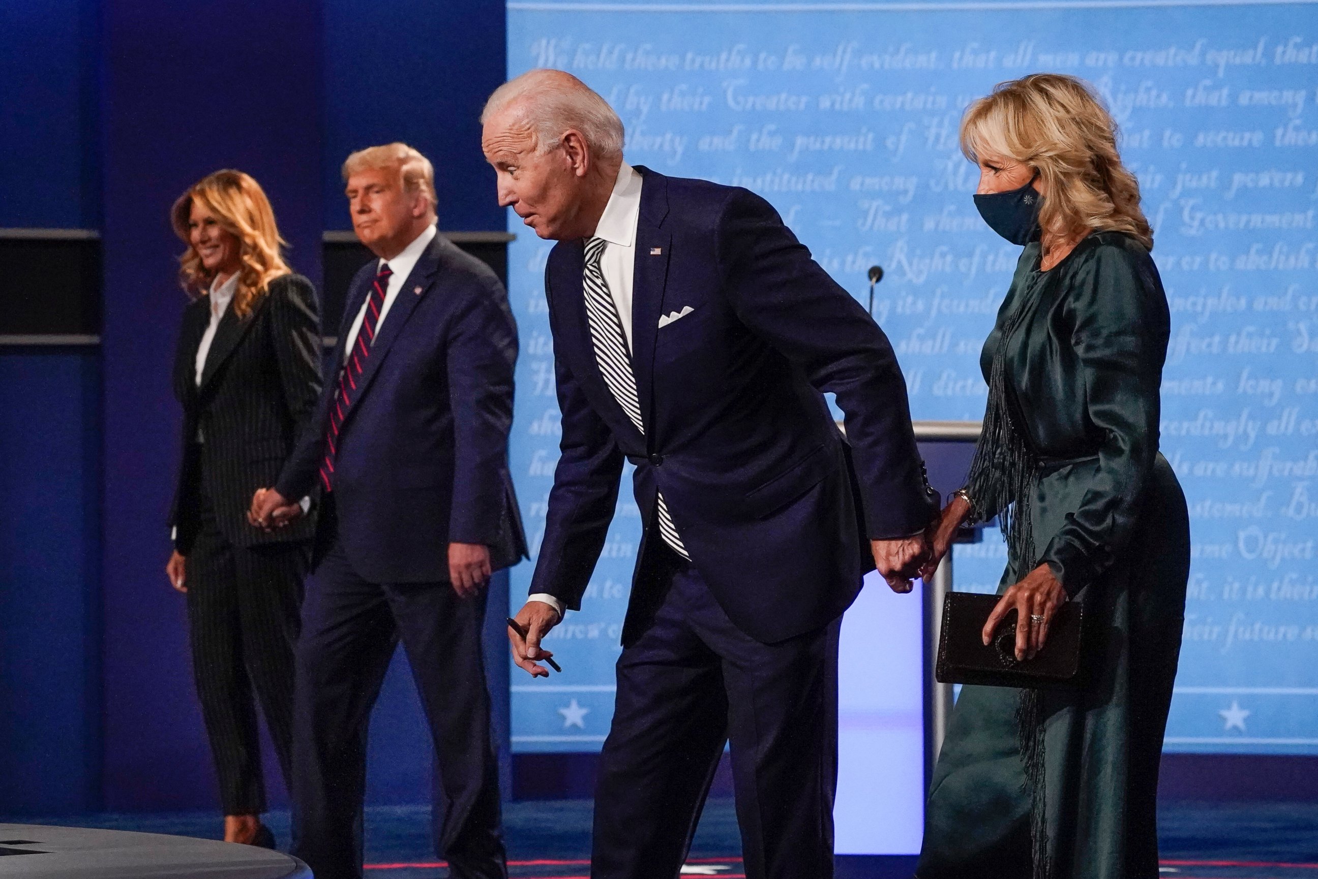 In this Sept. 29, 2020, file photo, from l-r., first lady Melania Trump, President Donald Trump, Democratic presidential candidate former Vice President Joe Biden and Jill Biden during the first presidential debate at Case Western University and Clev