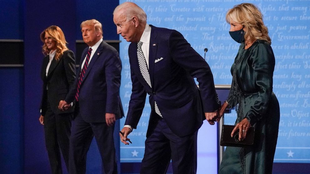 In this Sept. 29, 2020, file photo, from l-r., first lady Melania Trump, President Donald Trump, Democratic presidential candidate former Vice President Joe Biden and Jill Biden during the first presidential debate at Case Western University and Clev