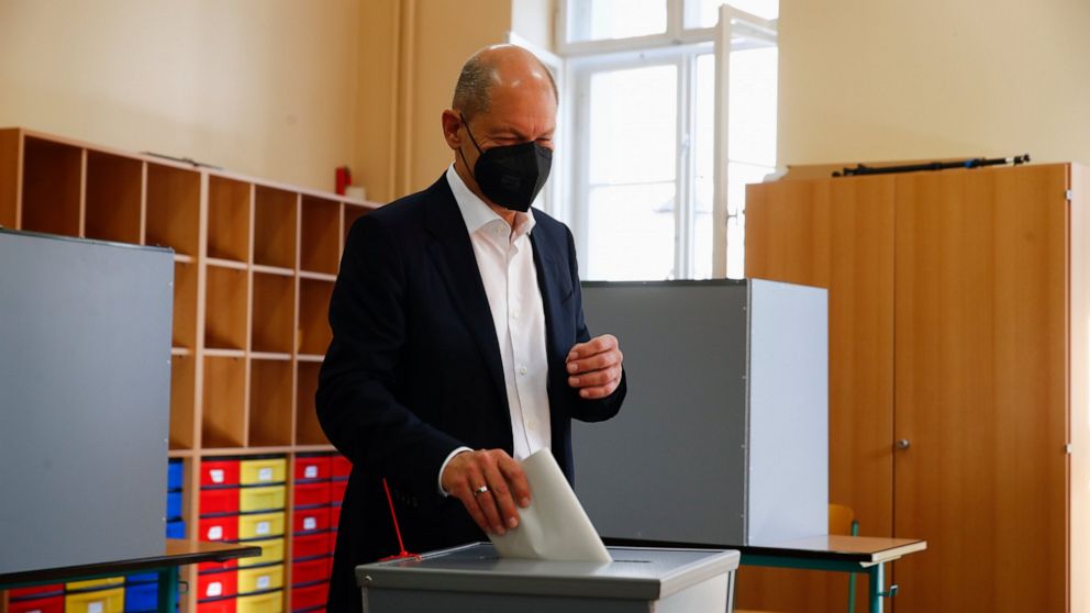 Social Democratic Party, SPD, candidate for chancellor Olaf Scholz casts his vote for the German parliament election in Potsdam, Berlin, Germany, Sunday, Sept. 26, 2021. (Wolfgang Rattay/Pool via AP)