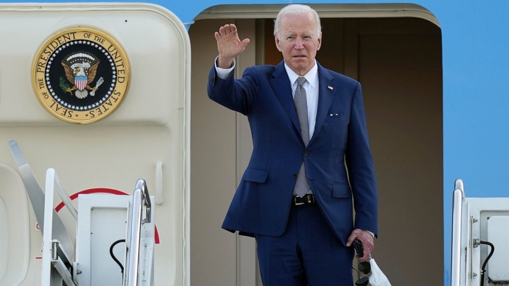 U.S. President Joe Biden waves as he boards Air Force One at Yokota Air Base in Fussa, Japan, Tuesday, May 24, 2022. (AP Photo/Eugene Hoshiko)