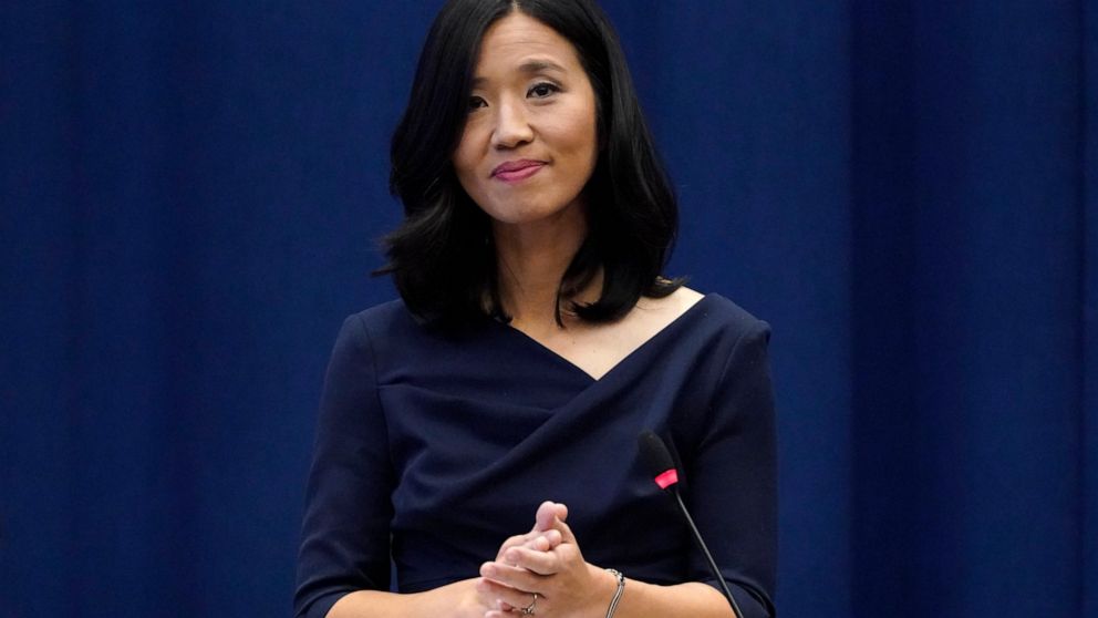 Michelle Wu pauses while acknowledging a standing ovation after she was sworn-in as Boston Mayor during a ceremony at Boston City Hall, Tuesday, Nov. 16, 2021, in Boston. The election of Wu marked the first time that Boston voters elected a woman, or