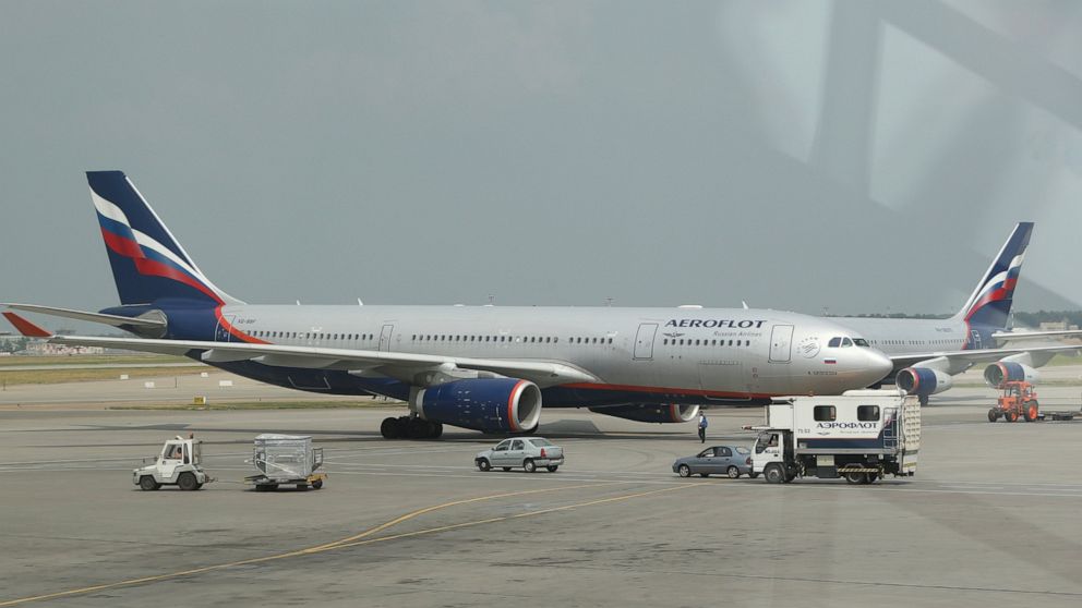 FILE - The Airbus A330 aircraft used for an Aeroflot international flight is prepared at Sheremetyevo airport in Moscow, on June 27, 2013. Europe and Canada said Sunday, Feb. 27, 2022, they would close their airspace to Russian airlines after Russia’