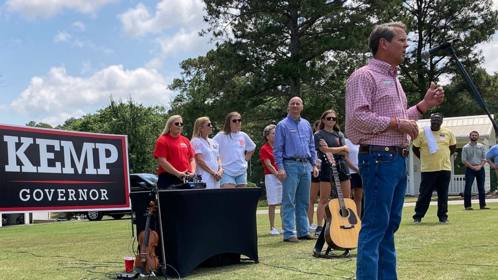 Georgia Gov. Brian Kemp speaks at a get-out-the-vote rally on Saturday, May 21, 2022, in Watkinsville, Ga. Kemp is seeking to beat former U.S. Sen David Perdue and others in a Republican primary for governor on Tuesday, May 24. (AP Photo/Jeff Amy)