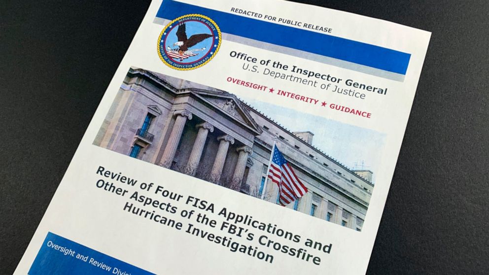 The cover page of the report issued by the Department of Justice inspector general is photographed in Washington, Monday, Dec. 9, 2019. The report on the origins of the Russia probe found no evidence of political bias, despite performance failures. (