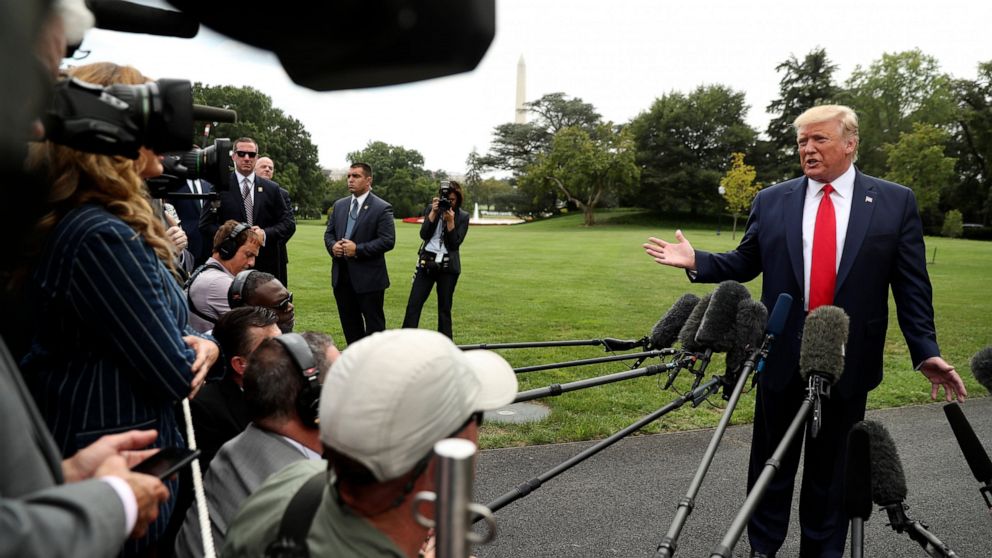 President Donald Trump speaks to members of the media on the South Lawn of the White House in Washington, Monday, Sept. 9, 2019, before boarding Marine One for a short trip to Andrews Air Force Base, Md., and then on to North Carolina. (AP Photo/Andr