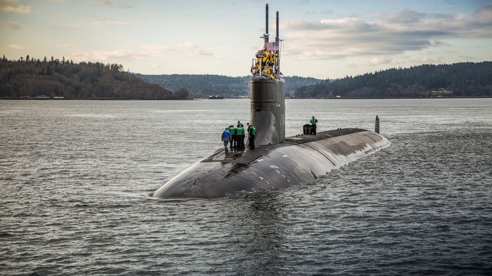 In this Dec. 15, 2016, photo, provided by the U.S. Navy, the Seawolf-class fast-attack submarine USS Connecticut (SSN 22) departs Puget Sound Naval Shipyard for sea trials following a maintenance availability. A Navy official says a submarine that co