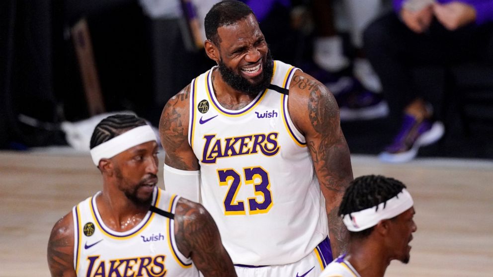 Los Angeles Lakers' LeBron James (23) reacts during the first half in Game 6 of basketball's NBA Finals against the Miami Heat Sunday, Oct. 11, 2020, in Lake Buena Vista, Fla. (AP Photo/Mark J. Terrill)