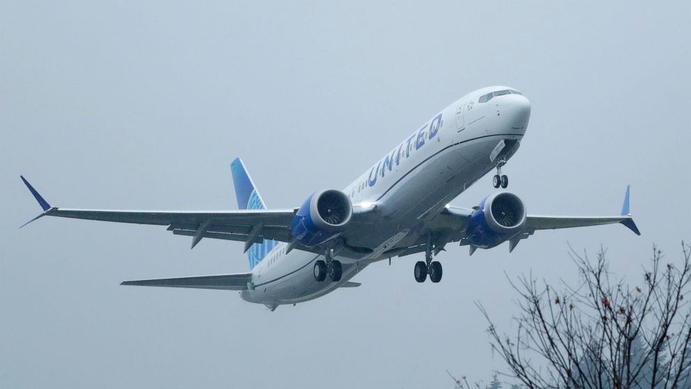 FILE - In this Wednesday, Dec. 11, 2019, file photo, a United Airlines Boeing 737 Max airplane takes off in the rain, at Renton Municipal Airport in Renton, Wash. Federal auditors are issuing fresh criticism of the government agency that approved the