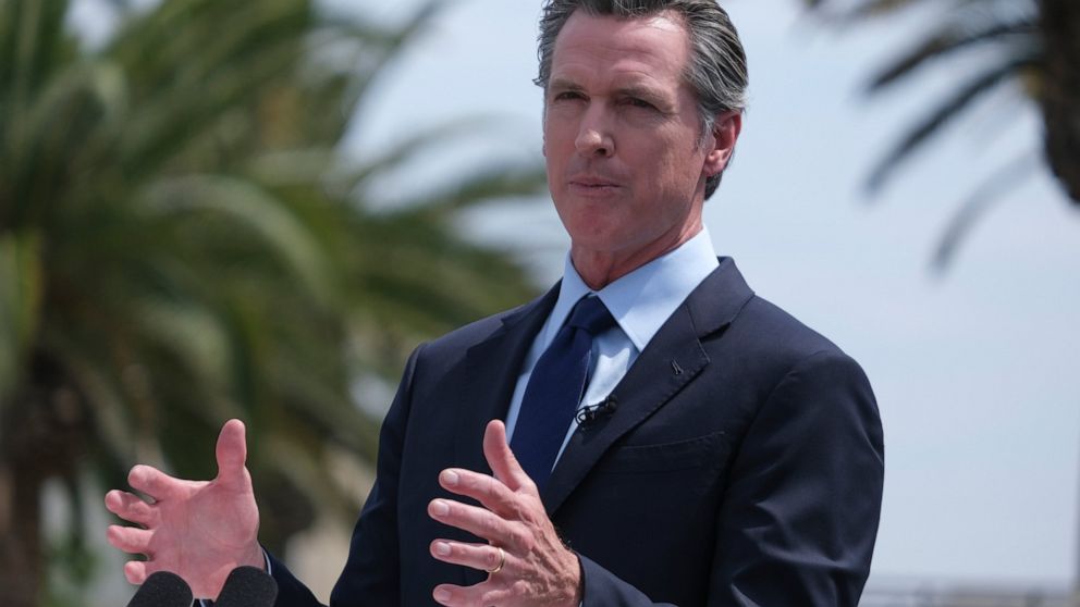 California Governor Gavin Newsom talks during a news conference at Universal Studios in Universal City, Calif., on Tuesday, June 15, 2021. Newsom is at risk of being on the recall ballot without his party ID – Democrat – next to his name. Newsom's ca