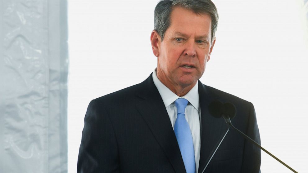 In this Feb. 11, 2020, photo, Georgia Governor Brian Kemp speaks during a dedication of the state's new Nathan Deal Judicial Center in Atlanta. Georgia election officials are postponing the state’s March 24 presidential primaries until May because of
