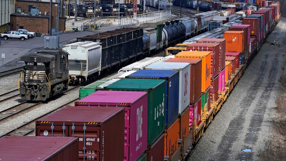 FILE - Freight train cars and containers at Norfolk Southern Railroad's Conway Yard in Conway, Pa., April 2, 2021. President Joe Biden's call for Congress to intervene in the railroad contract dispute undercuts the unions' efforts to address workers'