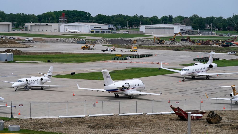 FILE - Planes sit on the tarmac at the Des Moines International Airport, Monday, June 13, 2022, in Des Moines, Iowa. With an eye on the upcoming July Fourth weekend, airlines are stepping up their criticism of federal officials over recent widespread