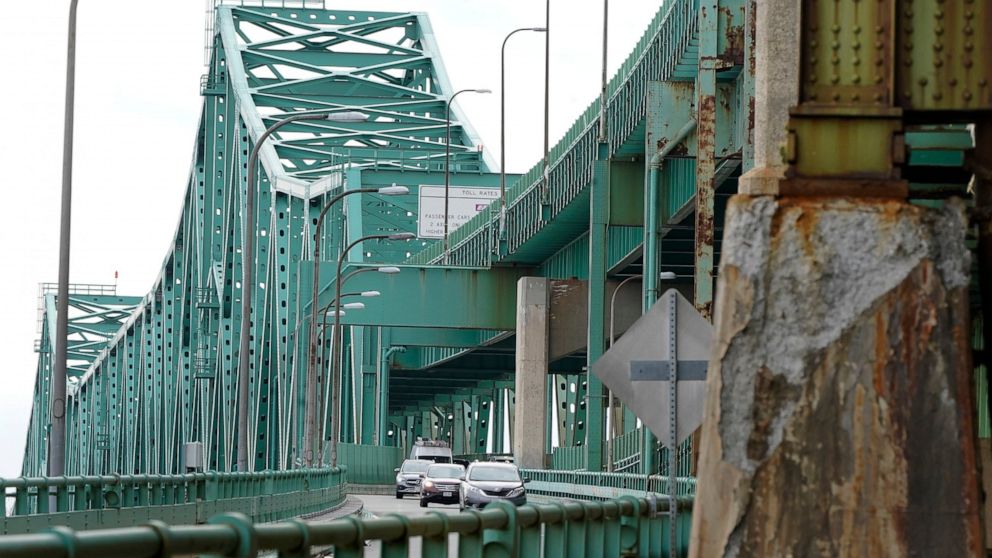 FILE - Drivers take an exit ramp off the Tobin Memorial Bridge, Wednesday, March 31, 2021, in Chelsea, Mass. The Transportation Department is launching a $27 billion program to repair and upgrade roughly 15,000 highway bridges as part of the infrastr
