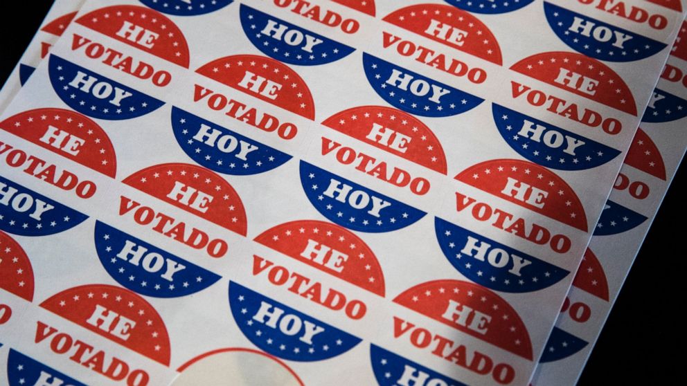 FILE - Shown in the Spanish language are "He Votado Hoy" stickers or I voted today at a polling place in Philadelphia, May 21, 2019. This month’s elections may have offered a preview of the Spanish-language misinformation that could pose a growing th
