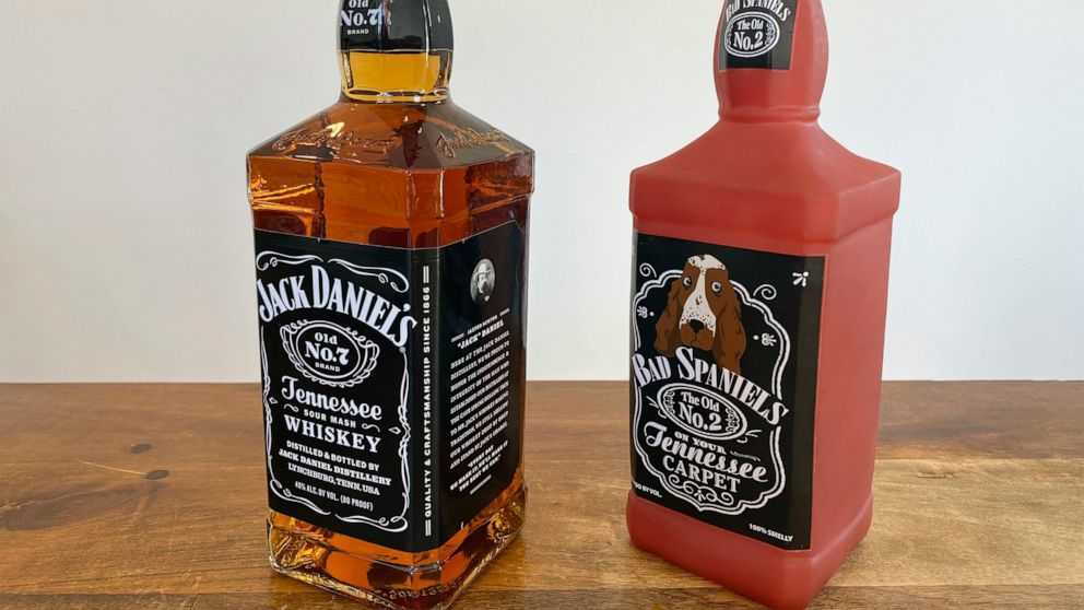 A bottle of Jack Daniel's Tennessee Whiskey is displayed next to a Bad Spaniels dog toy in Arlington, Va., Sunday, Nov. 20, 2022. Jack Daniel's has asked the Supreme Court justices to hear its case against the manufacturer of the toy. (AP Photo/Jessi