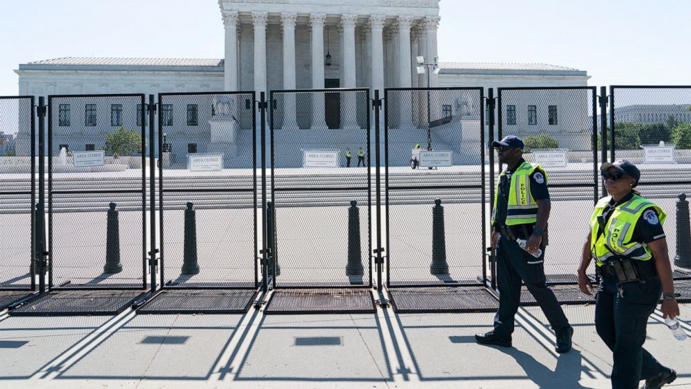 Security works outside of the Supreme Court, Thursday, June 30, 2022, in Washington. (AP Photo/Jacquelyn Martin)