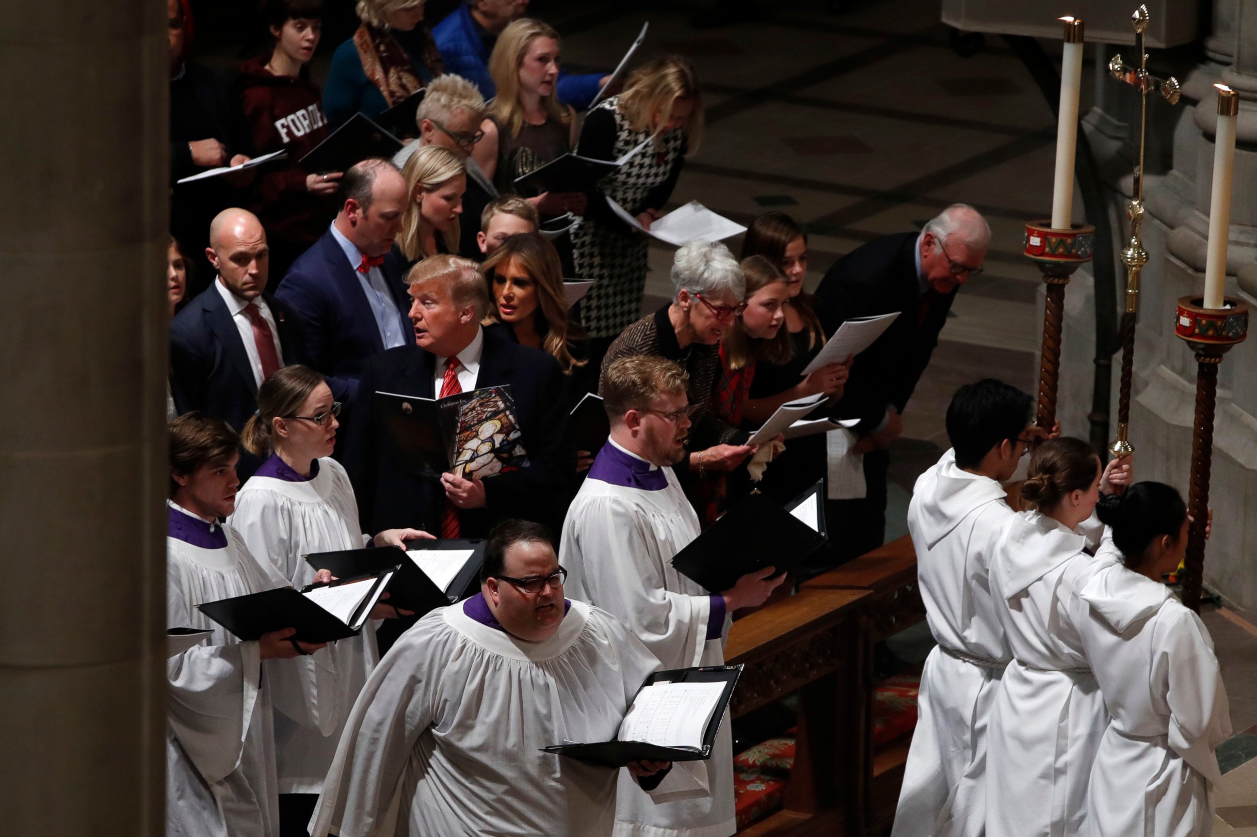 President Donald Trump and first lady Melania Trump attend a Christmas Eve service at the National Cathedral, Monday, Dec. 24, 2018, in Washington. 