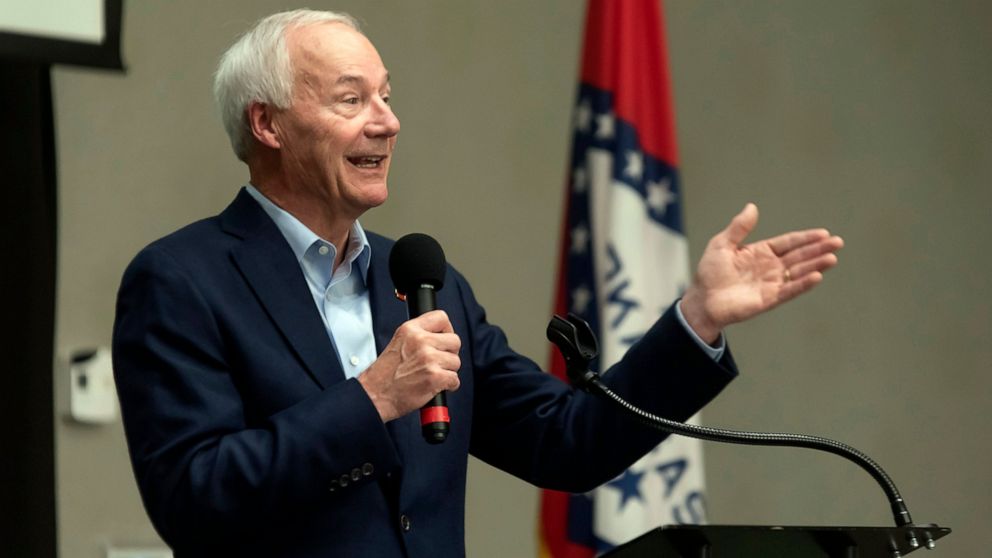 FILE - In this July 15, 2021, file photo, Arkansas Gov. Asa Hutchinson speaks during a town hall meeting in Texarkana, Ark. Hutchinson is Arkansas' top Republican and is leaving office in January with strong approval numbers, but he's been conspicuou