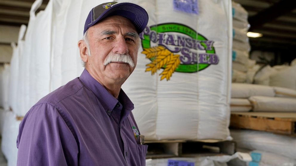 Adrian Polansky, a farmer and former executive director of the USDA’s Farm Service Agency office in Kansas during the Obama administration, stops for a photo while touring his seed processing plant near Belleville, Kan., Friday, March 5, 2021. More t