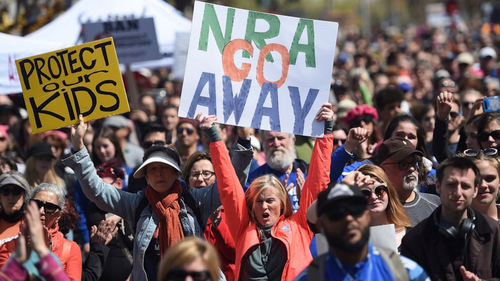 FILE - In this March 24, 2018, file photo, crowds of people participate in the March for Our Lives rally in support of gun control in San Francisco. The National Rifle Association sued San Francisco on Monday, Sept. 9, 2019, over the city's recent de