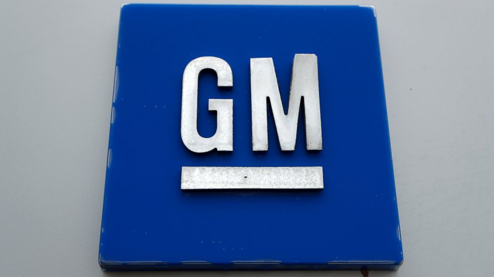 FILE - This Jan. 27, 2020 file photo shows a General Motors logo at the General Motors Detroit-Hamtramck Assembly plant in Hamtramck, Mich. General Motors now says it will support efforts by the United Auto Workers union to organize employees at two 