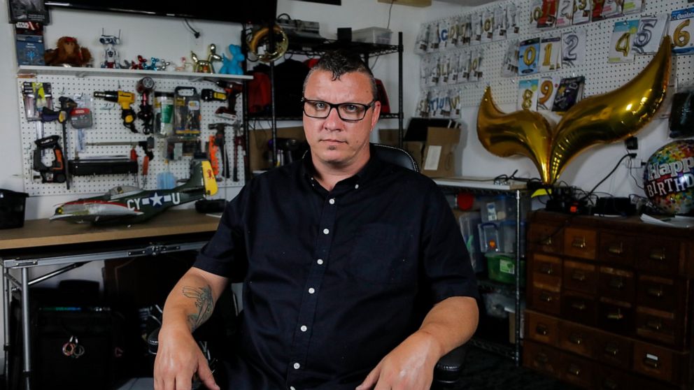 In a photo taken Friday, June 5, 2020, Scott Nichols, aka Amazing Scott, a local balloon artist, poses for The Associated Press in his balloon shop in Minneapolis. Nichols doesn't consider himself very political, but when George Floyd died, he felt c