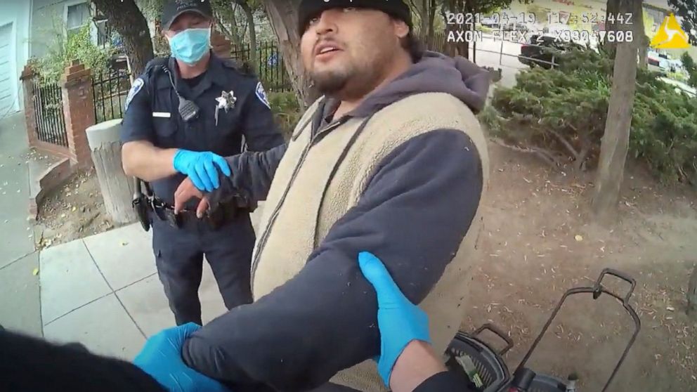 In this image taken from Alameda Police Department body camera video, Alameda Police Department officers attempt to take 26-year-old Mario Gonzalez into custody, April 19, 2021, in Alameda, Calif. The video goes on to show officers pinning Gonzalez t