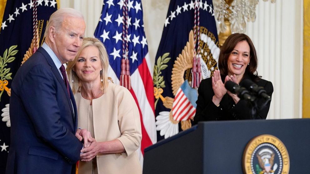 President Joe Biden talks with Gretchen Carlson as Vice President Kamala Harris applauds before Biden signs a bill to end forced arbitration in sexual harassment cases in the workplace, Thursday, March 3, 2022, in the East Room of the White House in 
