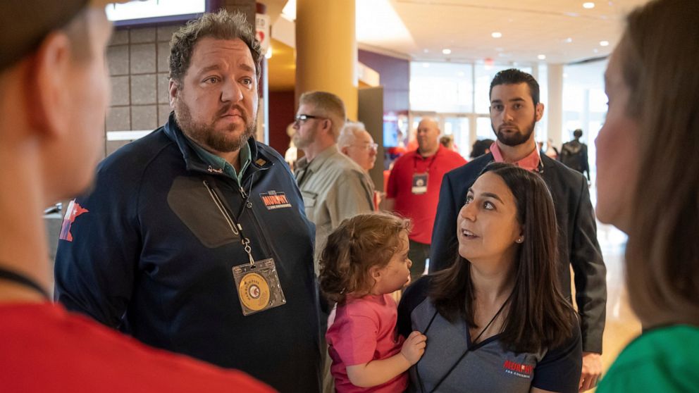 GOP candidate for governor Mike Murphy speaks with a people during the first day of the Minnesota State Republican Convention, Friday, May 13, 2022, at the Mayo Civic Center in. Rochester, Minn. (Glen Stubbe/Star Tribune via AP)