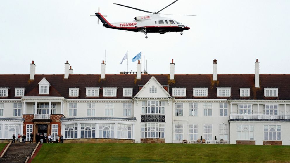 FILE - In this Aug. 1, 2015, file photo, then-presidential candidate Donald Trump leaves by his helicopter on the third day of the Women's British Open golf championship at the Turnberry golf course in Turnberry, Scotland. The Air Force is reviewing 