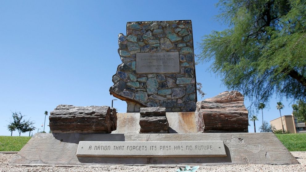 FILE - In this June 8, 2020, file photo, is a monument to the region's Confederate troops at a public plaza adjacent to the state Capitol in Phoenix. Republicans in the Arizona Legislature are reacting to last year's wave of damage to Confederate mon