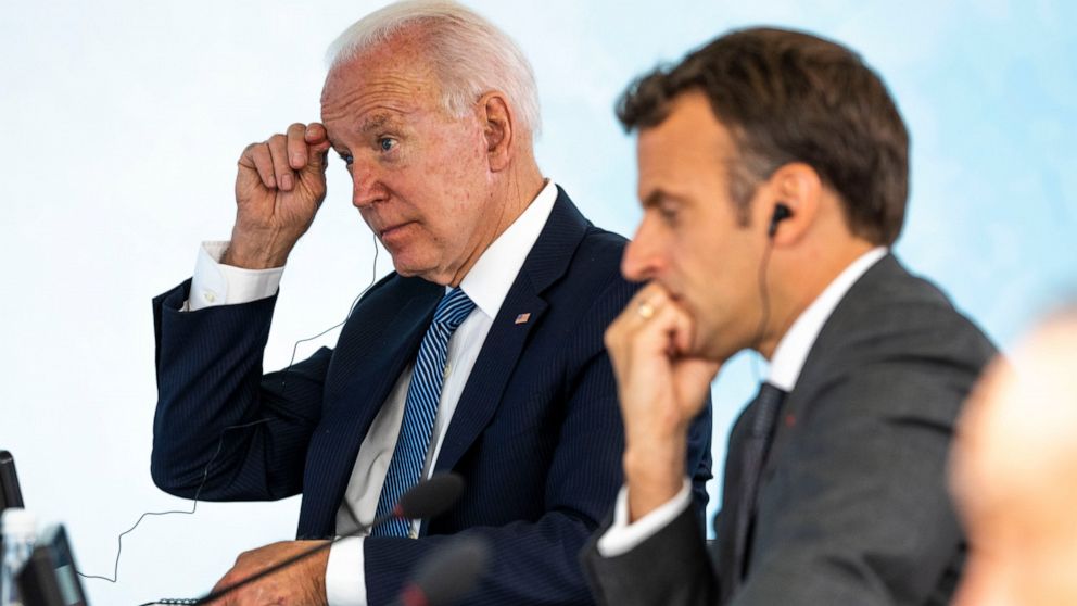 President Joe Biden talks with French President Emmanuel Macron during the final session of the G-7 summit in Carbis Bay, England, Sunday, June 13, 2021. (Doug Mills/The New York Times via AP, Pool)