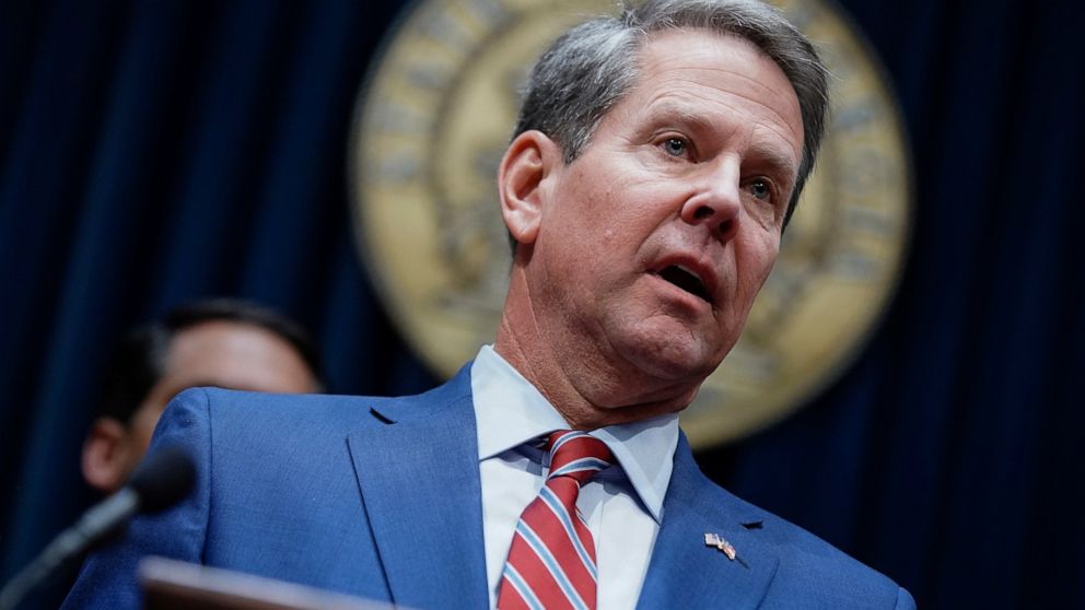 FILE - In this Dec. 4, 2019, file photo, Georgia Gov. Brian Kemp takes questions from the media at the Georgia state Capitol in Atlanta. Kemp will have to sit for questioning about comments he made that seemed to express concern about minority voter 