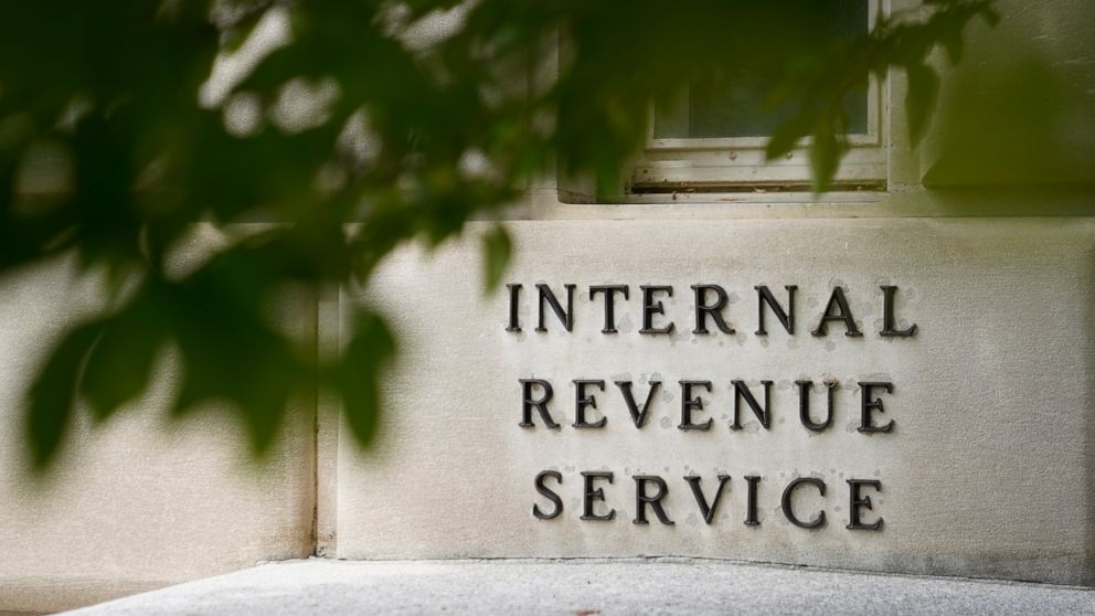 FILE - A sign is displayed outside the Internal Revenue Service building on May 4, 2021, in Washington. Conservative politicians and candidates are distorting how a major economic bill passed over the weekend by the Senate would reform the IRS and af