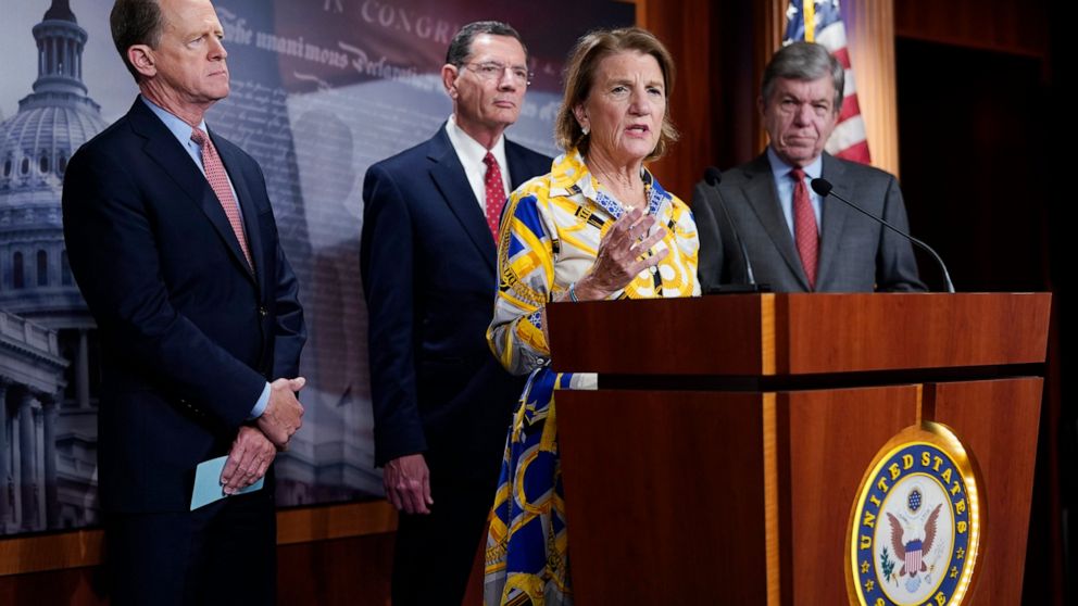 Sen. Shelley Moore Capito speaks at the Capitol in Washington, Thursday, May 27, 2021, as from left, Sen. Pat Toomey, R-Pa., Sen. Barrasso, R-Wy. and Sen. Roy Blunt, R-Mo., look on. Republican senators outlined a $928 billion infrastructure proposal 
