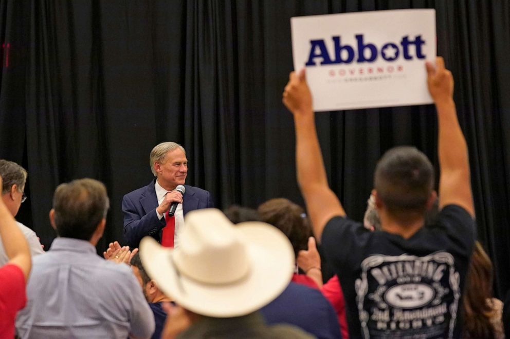PHOTO: Texas Gov. Greg Abbott, center, addresses supporters after his debate with Texas Democratic gubernatorial candidate Beto O'Rourke, Sept. 30, 2022, in McAllen, Texas.
