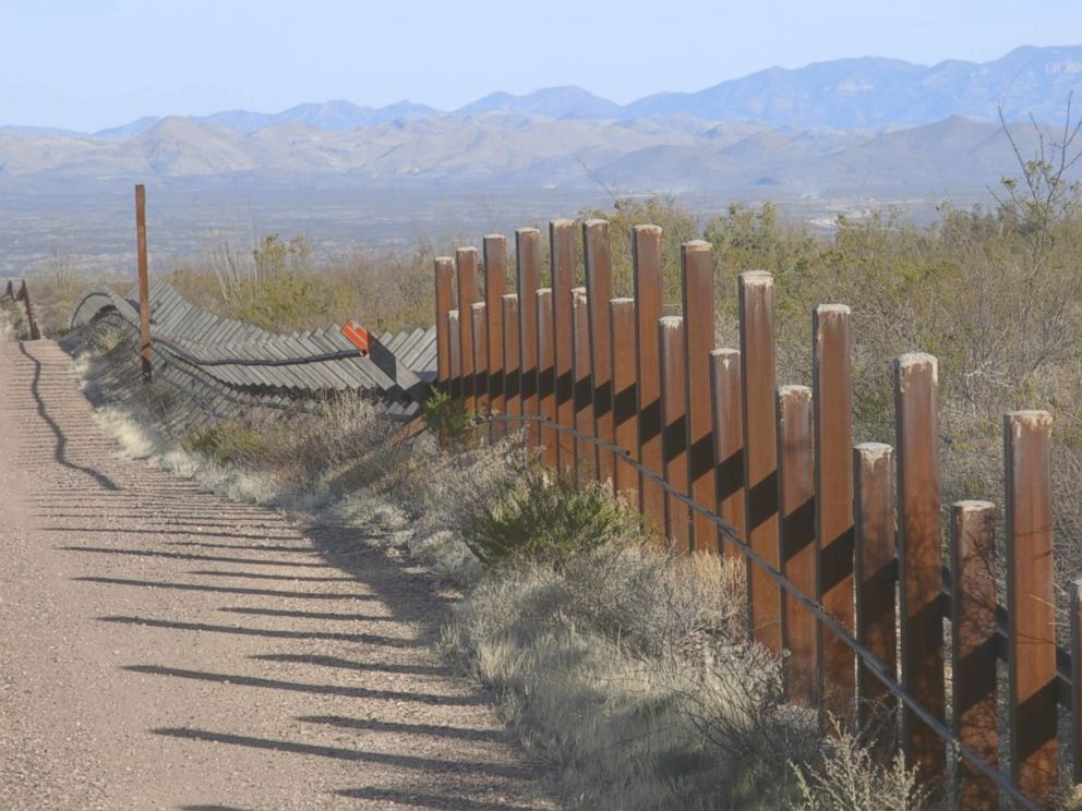 PHOTO: There are a number of different types of fencing used along the border, some less difficult to climb than others.