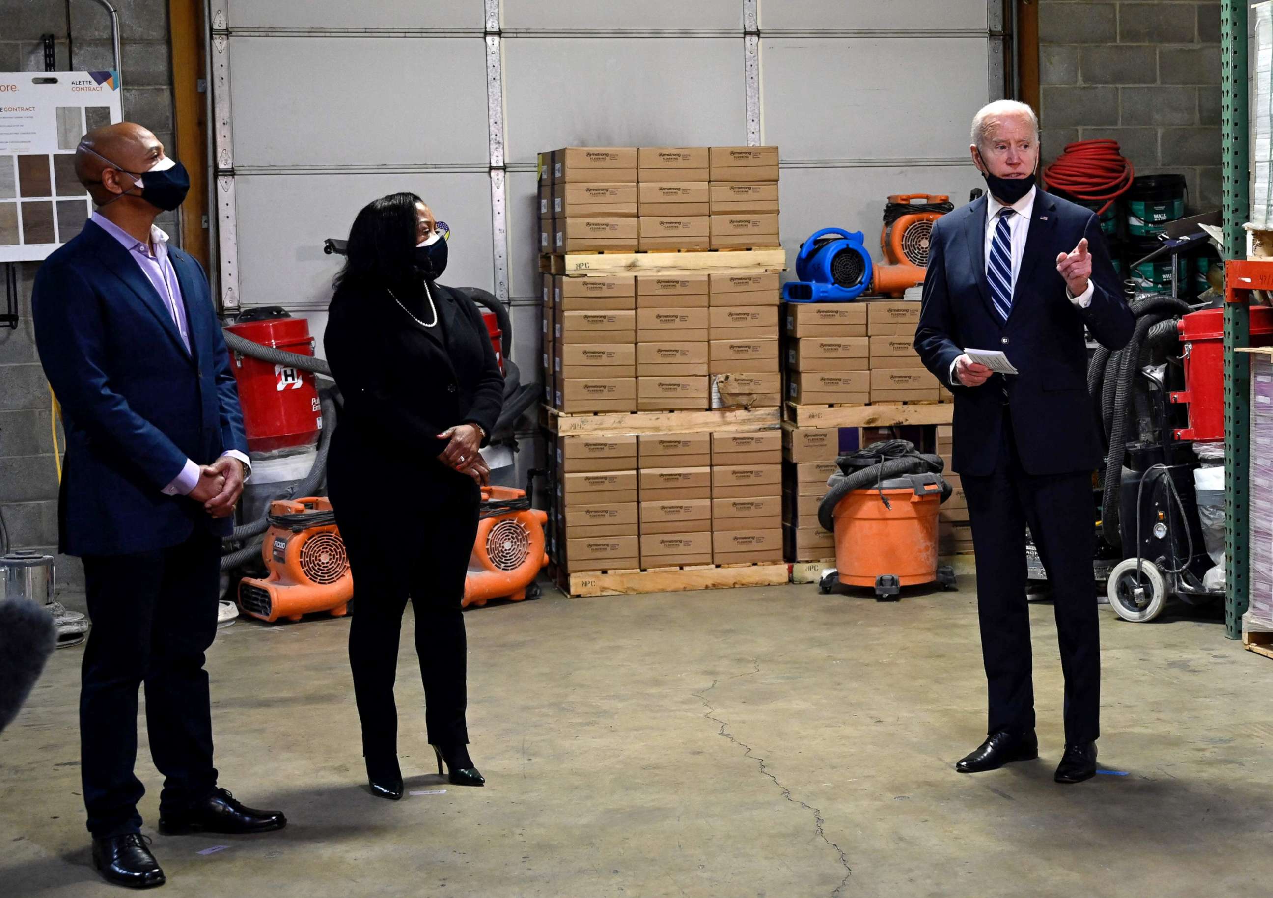 PHOTO: President Joe Biden visits Smith Flooring, a small minority-owned business, to promote his American Rescue Plan in Chester, Pa., March 16, 2021.