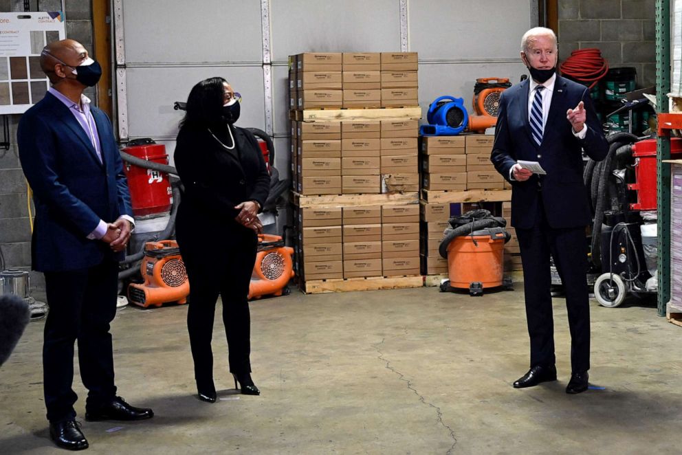 PHOTO: President Joe Biden visits Smith Flooring, a small minority-owned business, to promote his American Rescue Plan in Chester, Pa., March 16, 2021.