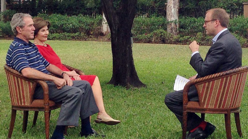 Former President George W. Bush and wife Laura speak with ABC News' Jon Karl.