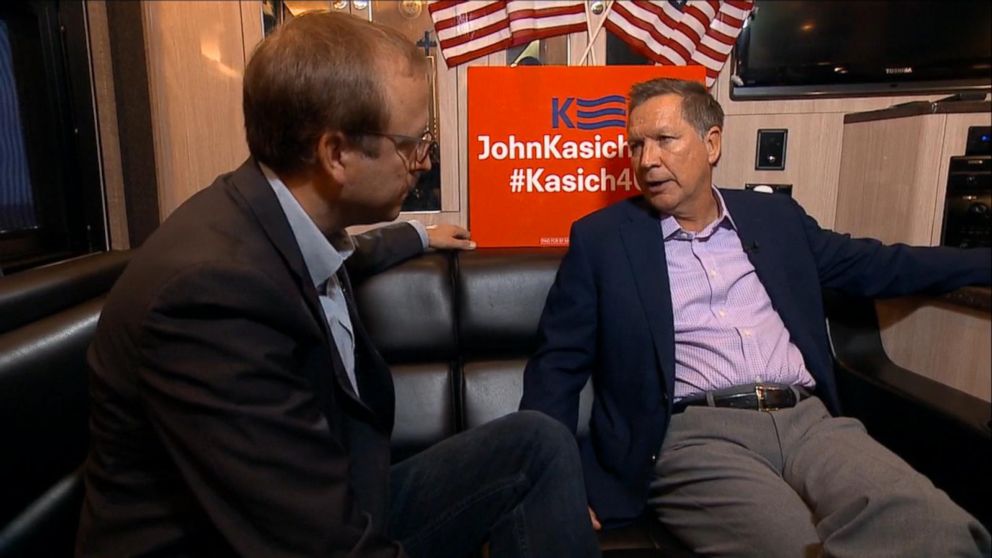 Republican presidential candidate John Kasich, the governor of Ohio, speaks with ABC News' Jonathan Karl as his campaign bus toured southeast New Hampshire, on Nov. 5, 2015.