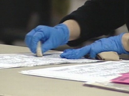 VIDEO: County workers in California are using rubber erasers to scrub smudges on mail-in ballots.