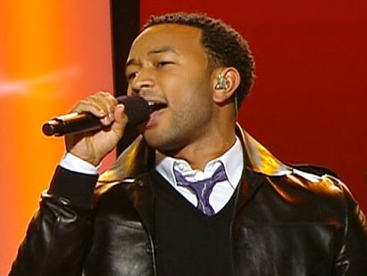Picture of John Legend singing at the DNC.