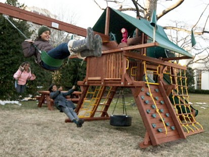VIDEO: Sasha and Malia Obama get a new swing set.