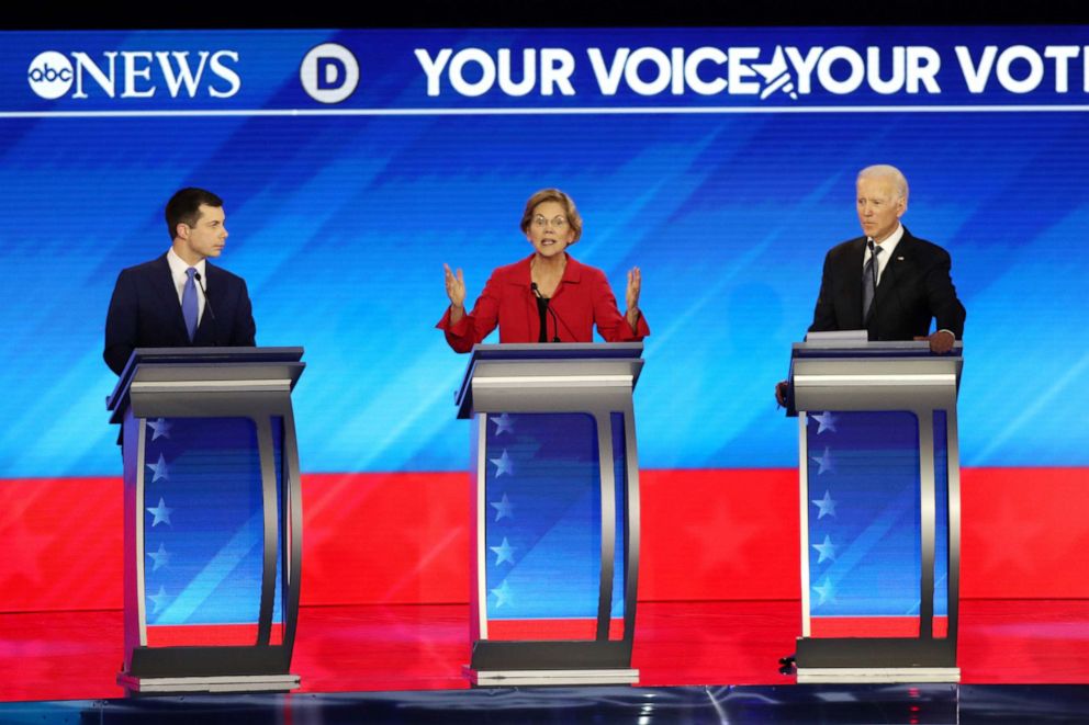 PHOTO: Democratic presidential candidates Pete Buttigieg, Sen. Elizabeth Warren and former Vice President Joe Biden participate in the Democratic presidential primary debate in the Sullivan Arena at St. Anselm College on Feb. 7, 2020 in Manchester, N.H.