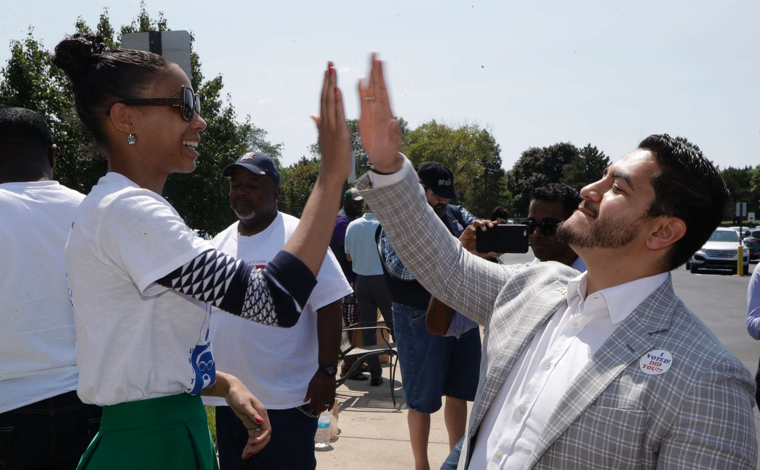PHOTO: Dr. Abdul El-Sayed high-fives supporter Sonique Watson in Detroit, Aug. 8, 2017. 